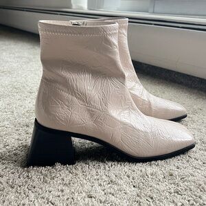 Katy Perry. New without tags. Size 9.5 Textured Cream Ankle Booties